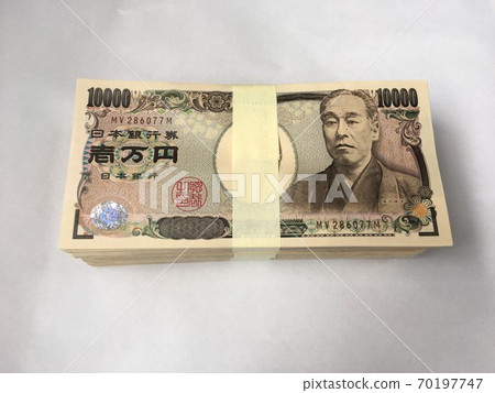 A bundle of stacked million yen bills A bundle of stacked million yen bills 70197747