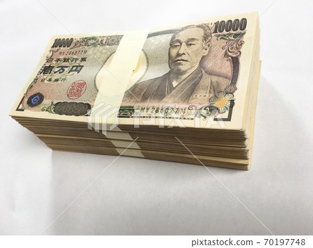 A bundle of stacked million yen bills A bundle of stacked million yen bills 70197748