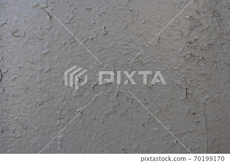 Close-up - gray-brown stone wall in the old facade of the house Close-up - gray-brown stone wall in the old facade of the house 70199170