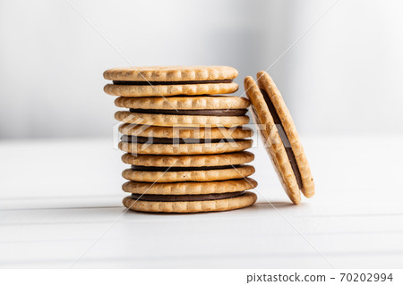 Sandwich cookies. Sweet biscuits with cream. 70202994