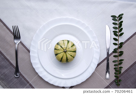 Thanksgiving or Halloween place setting with mini pumpkin  70206461