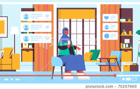 arab woman blogger using smartphone recording online video blog live streaming blogging concept 70207669
