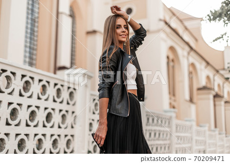 Stylish joyful cute young woman with a cute smile Stylish joyful cute young woman with a cute smile 70209471
