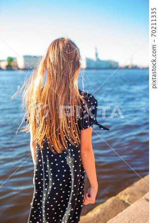 Cute little girl in Saint Petersburg in Russia Cute little girl in Saint Petersburg in Russia 70211335