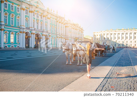 Little girl visiting the Hermitage in Saint-Petersburg. Little girl visiting the Hermitage in Saint-Petersburg. 70211340