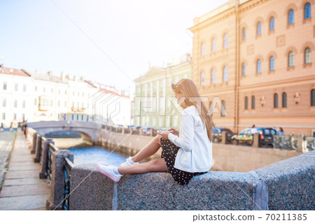 Cute little girl in Saint Petersburg in Russia 70211385