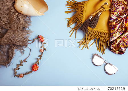 diverse travel girlish stuff on colorful background blue and yellow, nobody tourism lifestyle concept diverse travel girlish stuff on colorful background blue and yellow, nobody tourism lifestyle concept 70212319