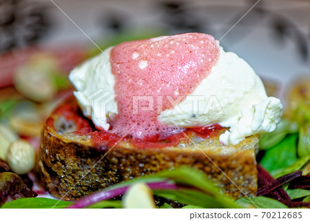 Bruschetta with goat cheese and beetroot mousse Bruschetta with goat cheese and beetroot mousse 70212685