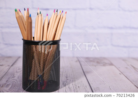 Group of color pencils on table with copy space. Group of color pencils on table with copy space. 70213426