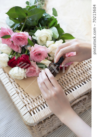 Female hands with aroma oil Female hands with aroma oil 70213684