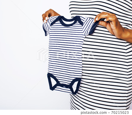 young pretty african american woman pregnant happy smiling, posing on white background isolated , lifestyle people concept copyspace close up young pretty african american woman pregnant happy smiling, posing on white background isolated , lifestyle people concept copyspace close up 70215023