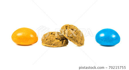 Row of colorful Pepernoten traditional dutch treats on white background Row of colorful Pepernoten traditional dutch treats on white background 70215755