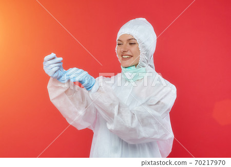 beautiful girl gestures to an empty space for the text. Presentation of your product. 70217970