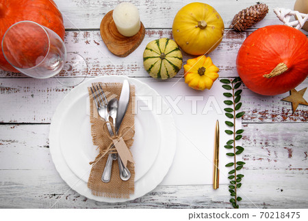 autumn composition with cutlery plate and pumpkins autumn composition with cutlery plate and pumpkins 70218475