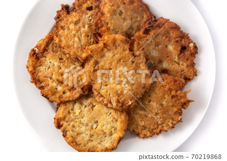 Traditional Jewish latkes or potato pancakes isolated on white background 70219868