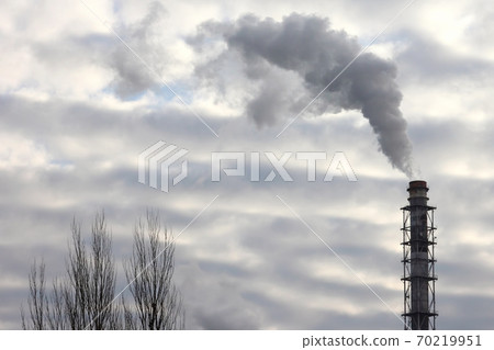 the smoke from the chimney of an industrial enterprise in the sky 70219951