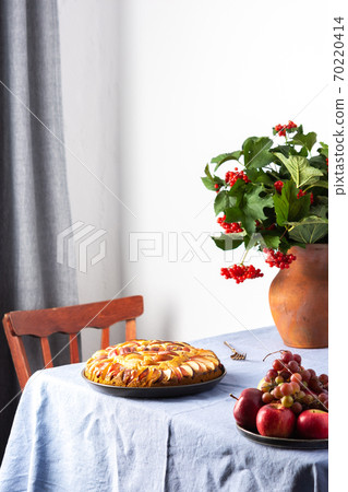 Delicious apple pie on the table Delicious apple pie on the table 70220414