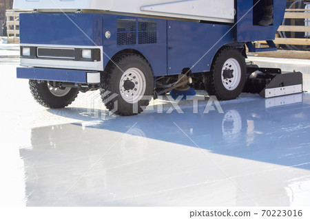special machine ice harvester cleans the ice rink. transport industry 70223016
