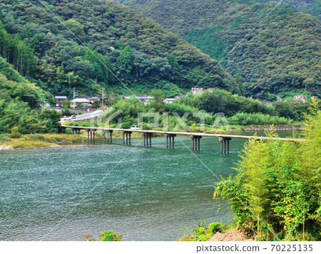 Nagoya Sebmersible Bridge over the Niyodo River and its scenery 70225135