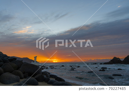 "Meotoiwa of Sakurai Futigaura" at sunset, Itoshima City, Fukuoka Prefecture 70227485