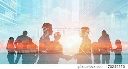 Silhouette view of business people team in group meeting Silhouette view of business people team in group meeting 70230350