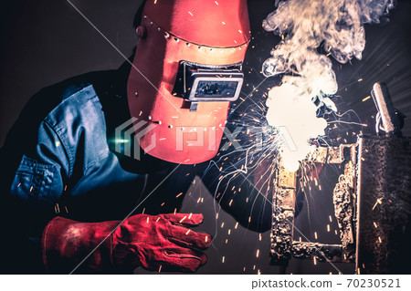 Metal welding steel works using electric arc welding machine Metal welding steel works using electric arc welding machine 70230521