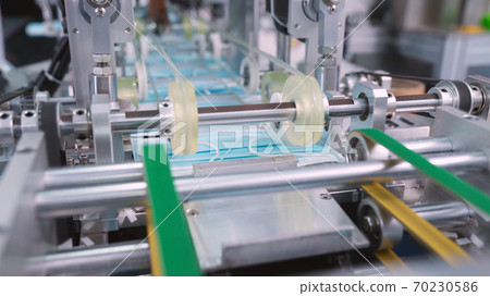 Face mask production line in modern factory 70230586