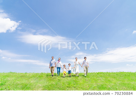 Three generations family, blue sky, walking 70230884