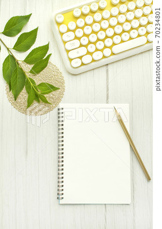 Yellow keyboard and writing instruments 70234801