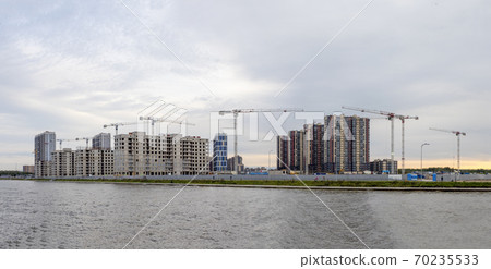 Construction work site and high rise building. Construction work site and high rise building. 70235533