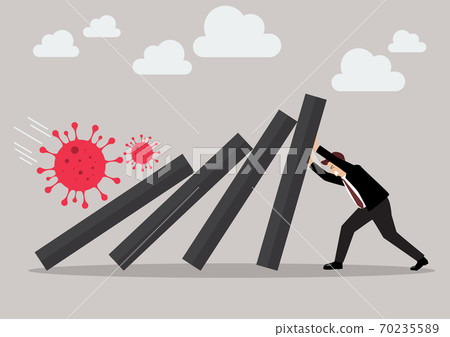 Businessman pushing hard against falling deck of domino tiles 70235589