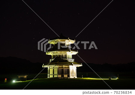 Kasaokakodaino Castle illuminated by sunset and illumination on an ancient hill 70236834