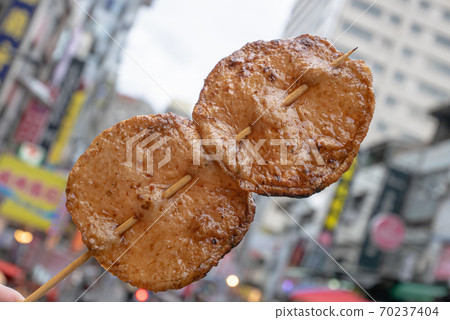 The close up of Taiwanese traditional barbecue (BBQ) food  at night market background in Taiwan.  70237404