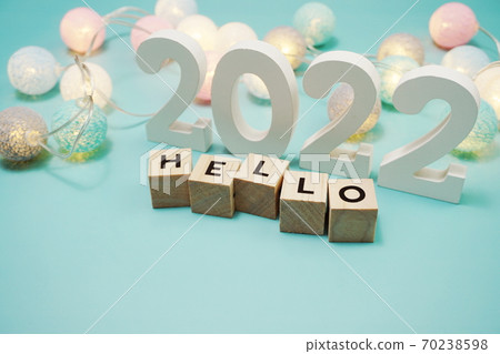 Hello 2022 alphabet letters with space copy on blue background Hello 2022 alphabet letters with space copy on blue background 70238598