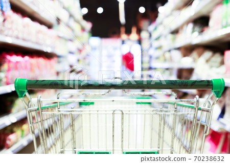 Shopping cart in supermarket, Abstract blurred photo in shopping malls, Cart in the market concept. 70238632