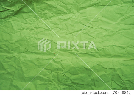Green crumpled paper empty background 70238842