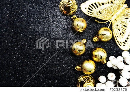 Christmas balls composition with space copy on Black glitter background Christmas balls composition with space copy on Black glitter background 70238876