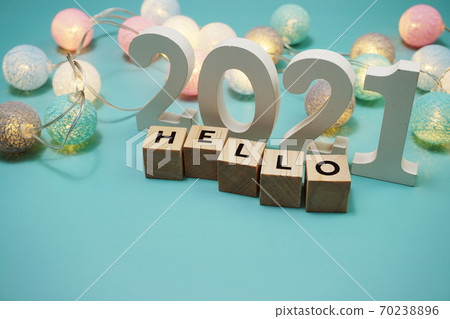 Hello 2021 alphabet letters with space copy on blue background Hello 2021 alphabet letters with space copy on blue background 70238896