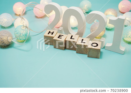 Hello 2021 alphabet letters with space copy on blue background Hello 2021 alphabet letters with space copy on blue background 70238900