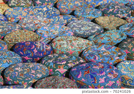 The traditional Uzbek cap, named tubeteika, on a market The traditional Uzbek cap, named tubeteika, on a market 70241026