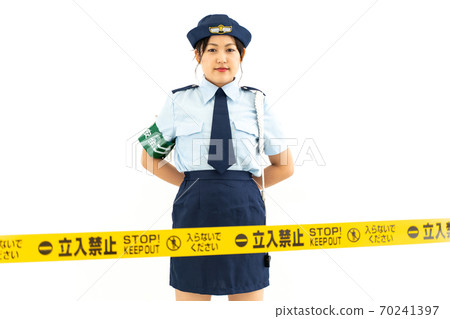 Policewoman standing on the regulatory line 70241397