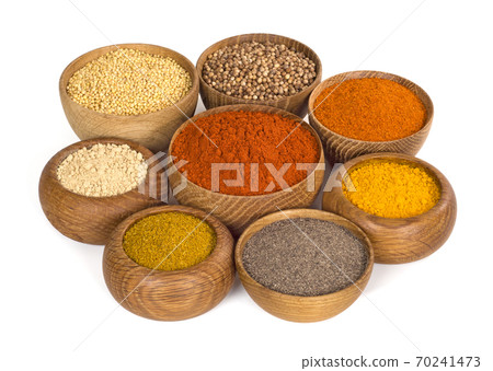 spices and seasoning in wooden bowl on white background spices and seasoning in wooden bowl on white background 70241473