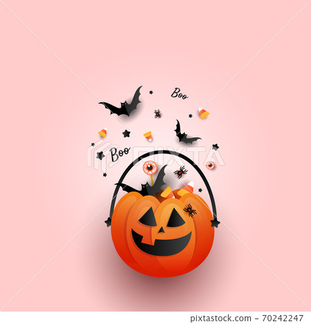 Halloween Jack o Lantern bucket overflowing with candy, bats, spider on pink background. Flat lay, top view with copy space 70242247