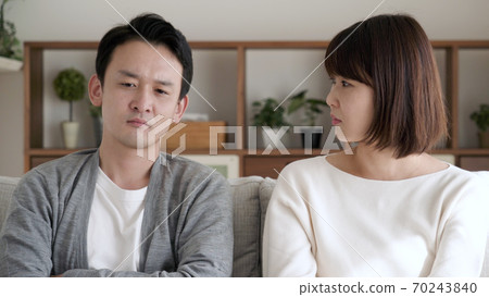 Couple discussing at home Couple discussing at home 70243840