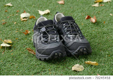Tourist boots on summer time. Tourist boots on summer time. 70245458