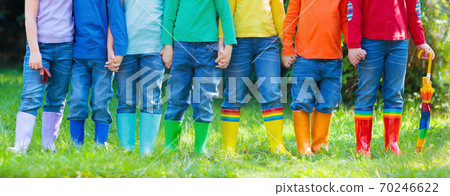 Kids in rain boots. Rubber boots for children. Kids in rain boots. Rubber boots for children. 70246622