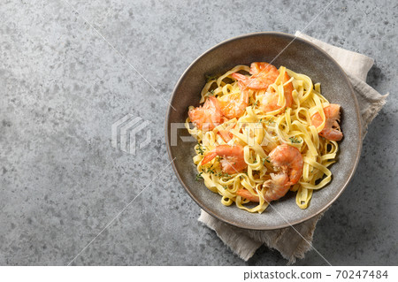 Italian pasta fettuccine with seafood, shrimps Italian pasta fettuccine with seafood, shrimps 70247484