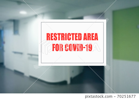 Sign on the door of a hospital corridor indicating an access area reserved for patients with covid-19 Sign on the door of a hospital corridor indicating an access area reserved for patients with covid-19 70251677
