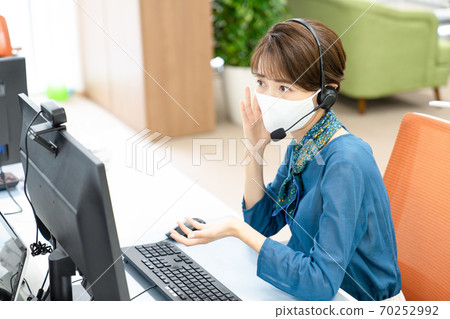 Young woman heading to the webcam 70252992