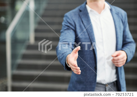 Friendly businessman 70253721